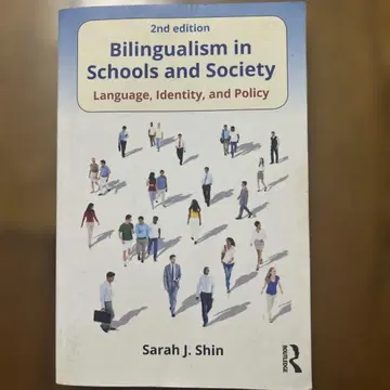 Bilingualism in Schools and Society