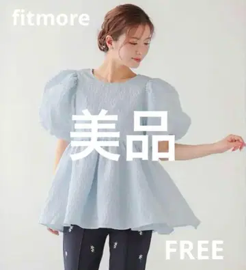 fitmore 핏모어 백리본 볼륨 슬리브 자카드 상의