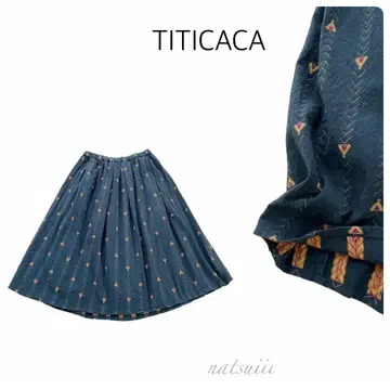 TITICACA 티티카카 . 트라이앵글 자수 개더 플레어 스커트