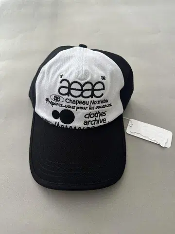 [미사용 새상품] aeae 캡 화이트 블랙 디자인 별 패턴 스타