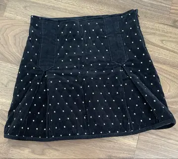 Bibiy. ODETTE PLEATED SKIRT