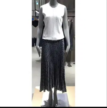 이론 비대칭 체크 패턴 플리츠 스커트