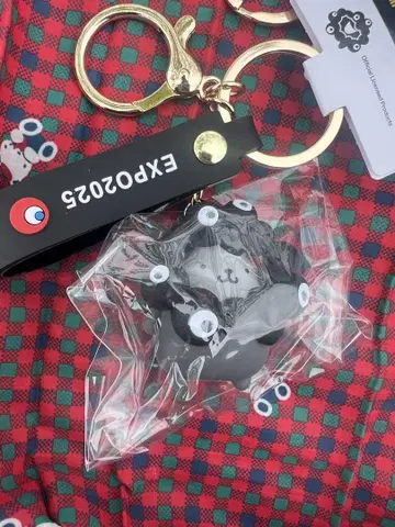 엑스포 검은 먘먘 산리오 키링 검정 변신 폼폼푸딩