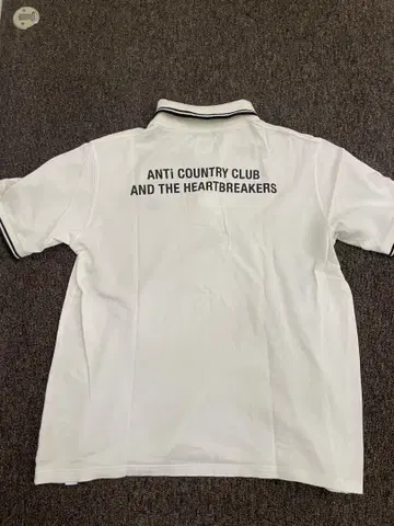 ANTI COUNTRY CLUB 폴로 셔츠