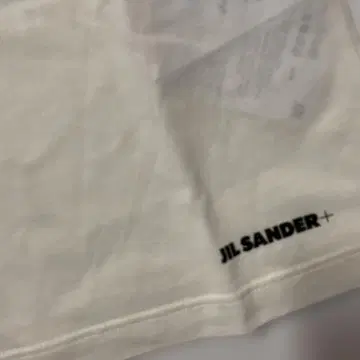 JIL SANDER 슬리브리스 상의 화이트
