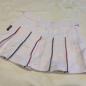 FILA 화이트 플리츠 스커트