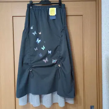 이즈스칼라 나비 패턴 프린트 메쉬 절개 롱 스커트