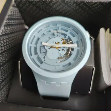 Swatch 스켈레톤 라이트 블루 고무 벨트 시계