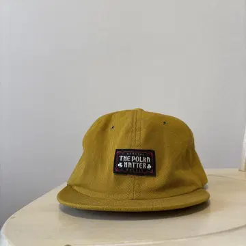 캡 머스타드 컬러