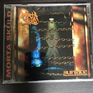 Morta skuld/ surface