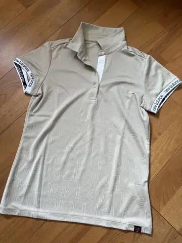 New Balance 여성용 피케 셔츠 베이지