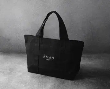Aman Tokyo 로고 블랙 토트백 코튼