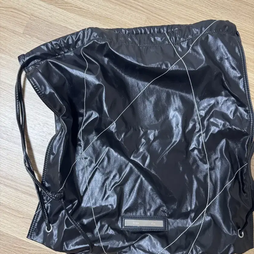 バッグ Martin Kim String Coating Back Pack MUSINSA公式 | MATIN KIM STRING COATING BACK PACK IN BLACK