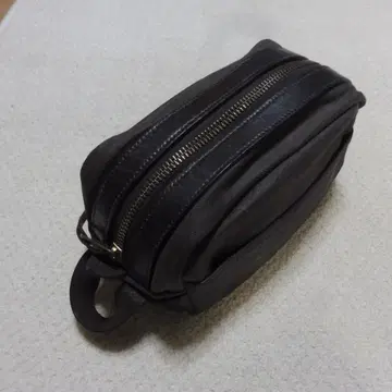 필슨 FILSON 코튼 오일 피니시 트래블 키트 파우치