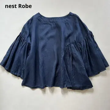 네스트로브 린넨 비대칭 개더 블라우스 블루