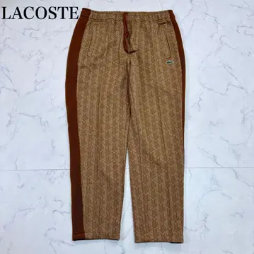 새상품급 LACOSTE 모노그램 테이퍼드 자카드 팬츠 L 상당