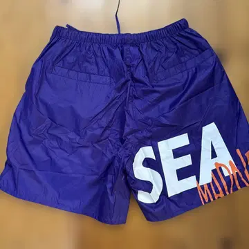 SEA 로고 보라색 숏팬츠. MADNESS