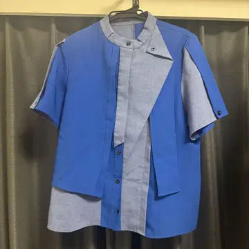 UNITED TOKYO 바이컬러 라이트 레이어 블라우스 BLU