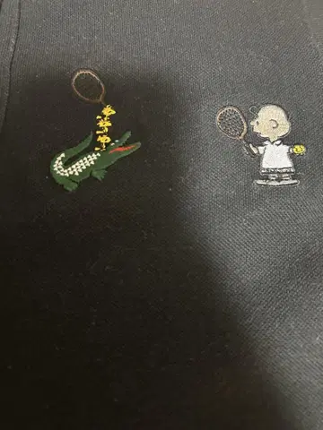 LACOSTE 블랙 스누피 콜라보 피케 셔츠 38
