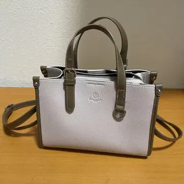연한 핑크 숄더백