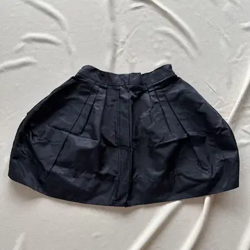 AMOMMA MINI TACK SKIRT