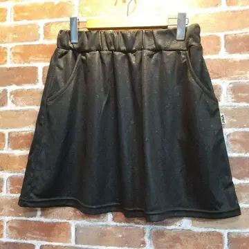 FILA 블랙 별 패턴 미니 스커트