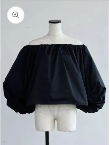 carla Otona whip off shoulder
