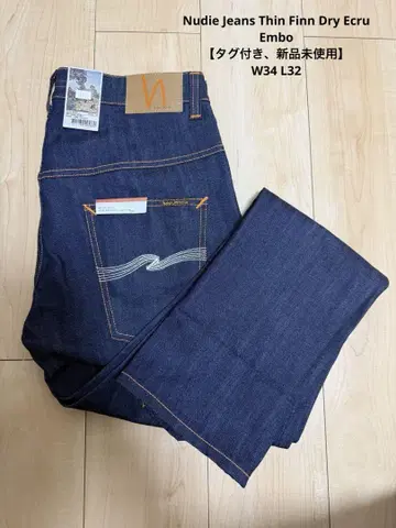 Nudie Jeans Thin Finn Dry Ecru Embo W34