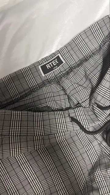 RTEC 체크 무늬 슬림 핏 팬츠