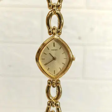 SEIKO 여성용 손목시계 2P20-5990 골드
