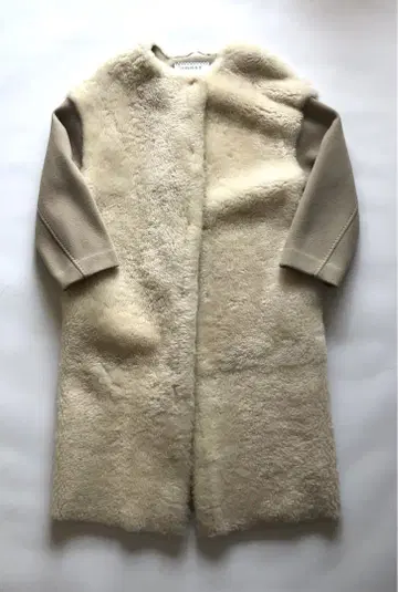 리얼 가죽 어도어 무스탕 코트 노카라 보아 절개 M