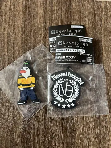 Novelbright 캡슐 러버 마스코트 초대 저스틴 엠블럼