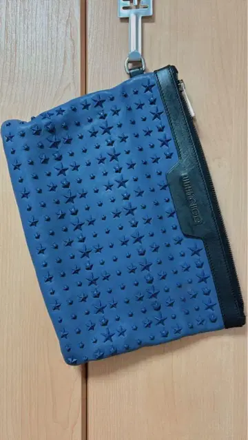 네이비 별 모양 디자인 클러치백