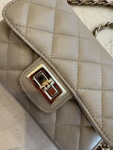오렌티 퀼팅 숄더백