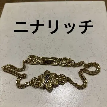 [ NINA RICCI ] 골드 팔찌 꽃 모티브
