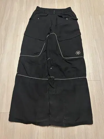 WANNA / Runes shot nylon pants BLACK
