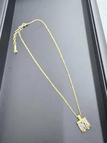 니나리치 골드 목걸이 NINA RICCI NR 로고 스톤 장식