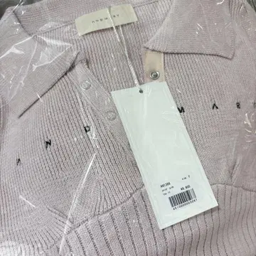 andmary lindsay logo tops