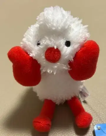 귀여운 봉제 인형 손을 든 캐릭터