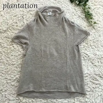 현행 플랜테이션 이소재 절개 니트 하이넥