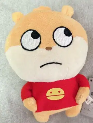 곤란한 표정의 오렌지 봉제 인형