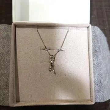 에테 레이어 다이아몬드 리본 목걸이