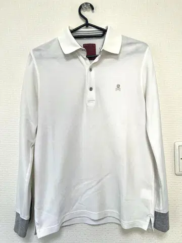 마크앤로나 긴팔 피케 셔츠 스컬 로고 자수