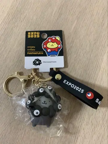 [ 한정판 ] 간사이 만박 산리오 블랙 미야쿠미야쿠 폼폼푸딩 키링