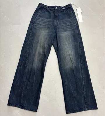 WYM LIDNM CURVED FLARE DENIM SLACKS 위임