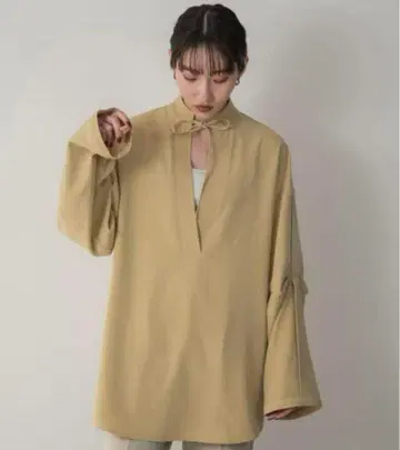 lawgy plunging neck ribbon blouse