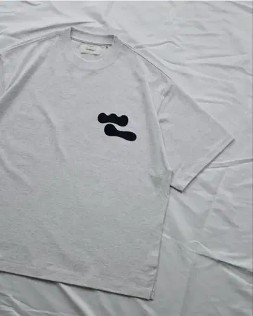 wonderland 스며드는 프린트 T셔츠
