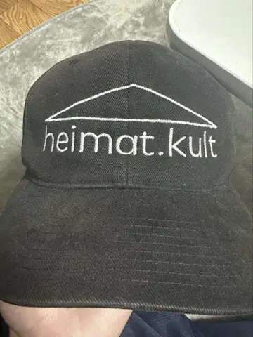 [ 기업 로고 ] heimat.kult 블랙 캡