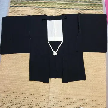 블랙의 전통적인 겉옷