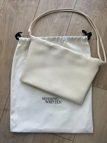 NOTHING WRITTEN Nella strap bag